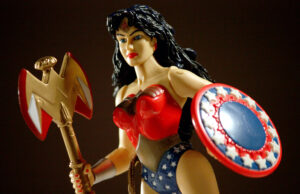 An picture of the iconic Wonder Woman toy from the 1990s. The features a strong, feminine figure in line with Linda Carter's portrayal of the DC character.