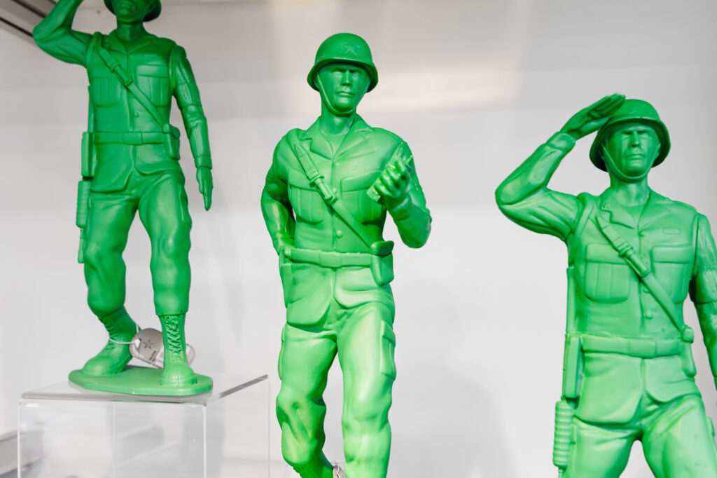 a close up of green plastic soldier toy figures
