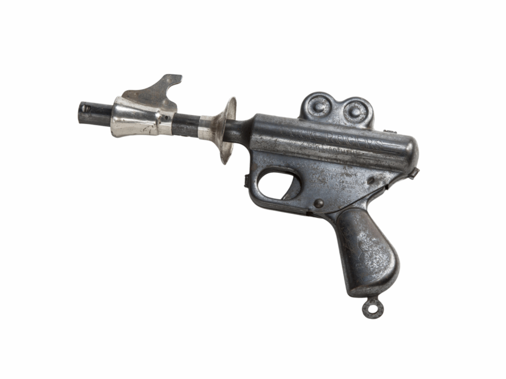 a vintage toy gun made of metal