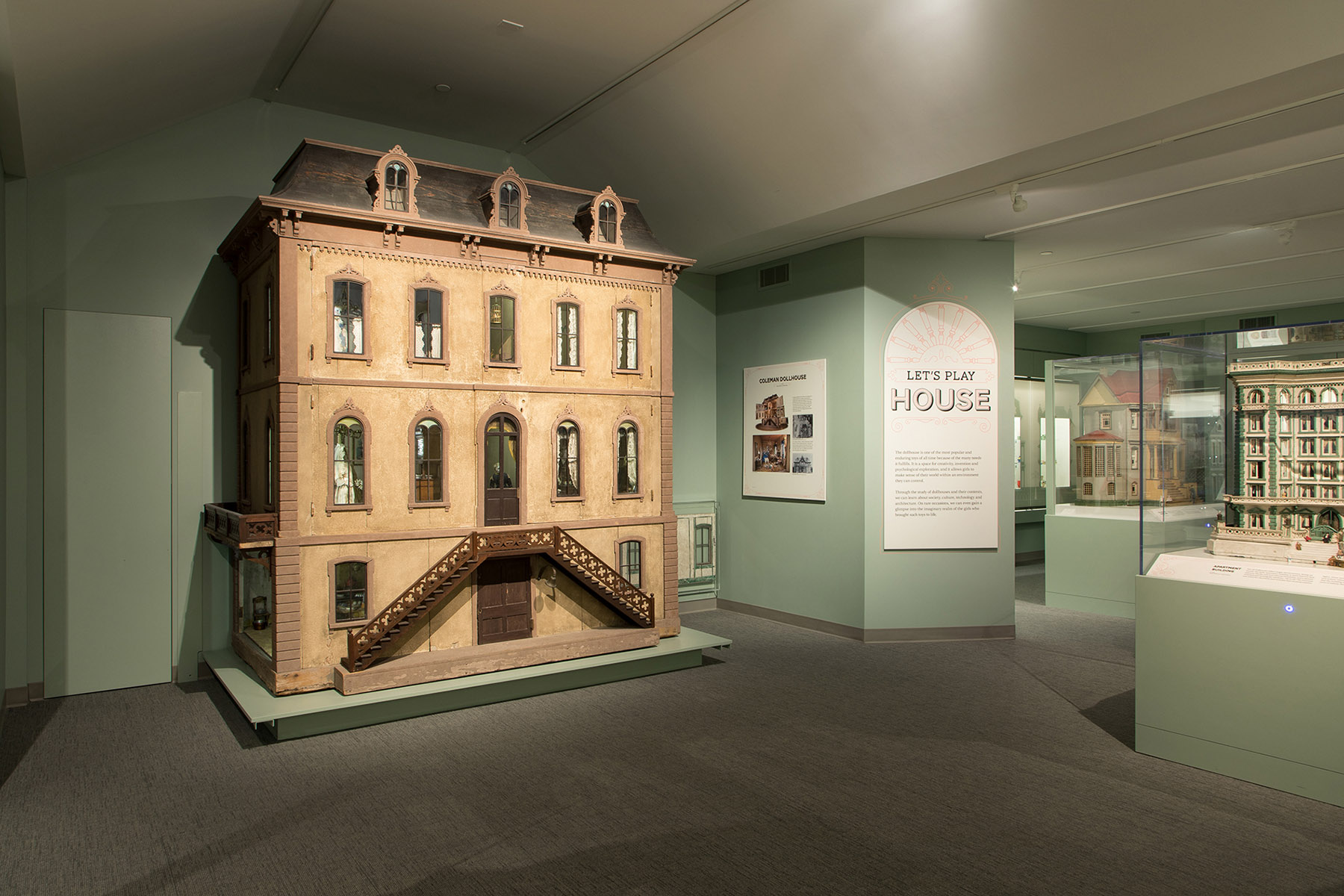 9ft tall beige dollhouse in the Doll Gallery.