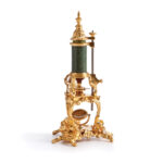 Green and gold Louis the XV microscope in miniature scale.