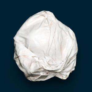 White abstract artwork in a ball made of wax and wool.