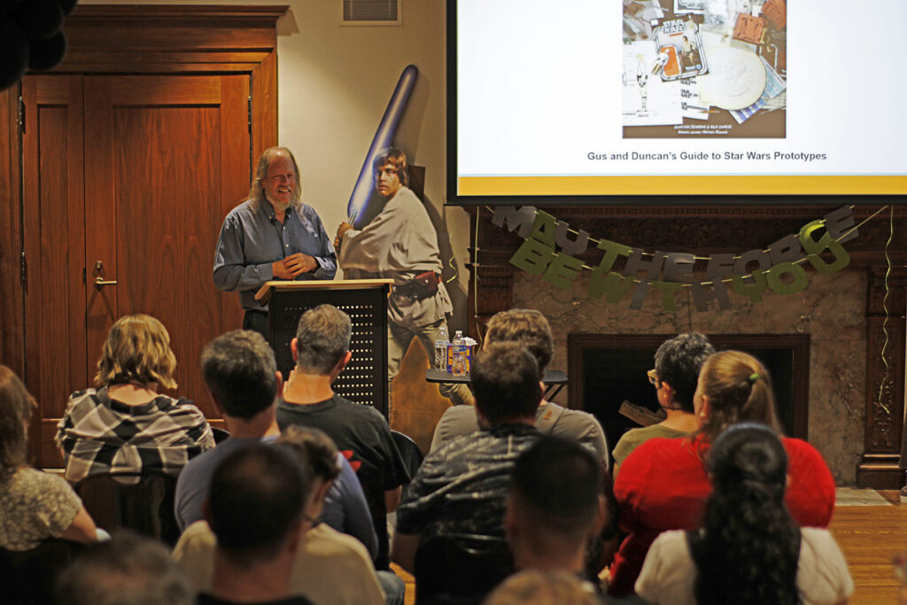 Crowd of people attending a Star Wars lecture by Duncan Jenkins.
