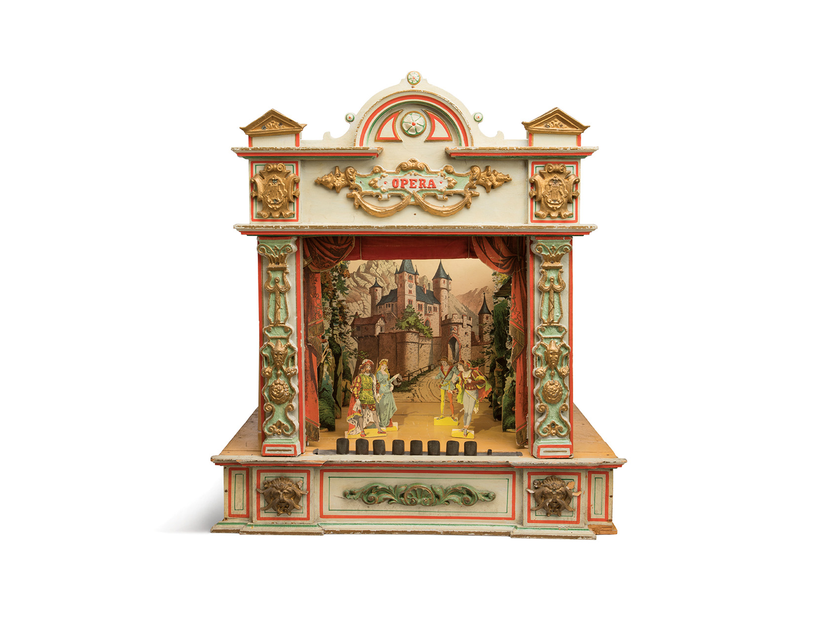 Image of a toy opera house with a stage and paper doll figures.