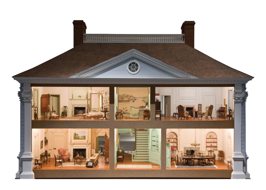 Ornate fine-scale miniature house glowing with many rooms.