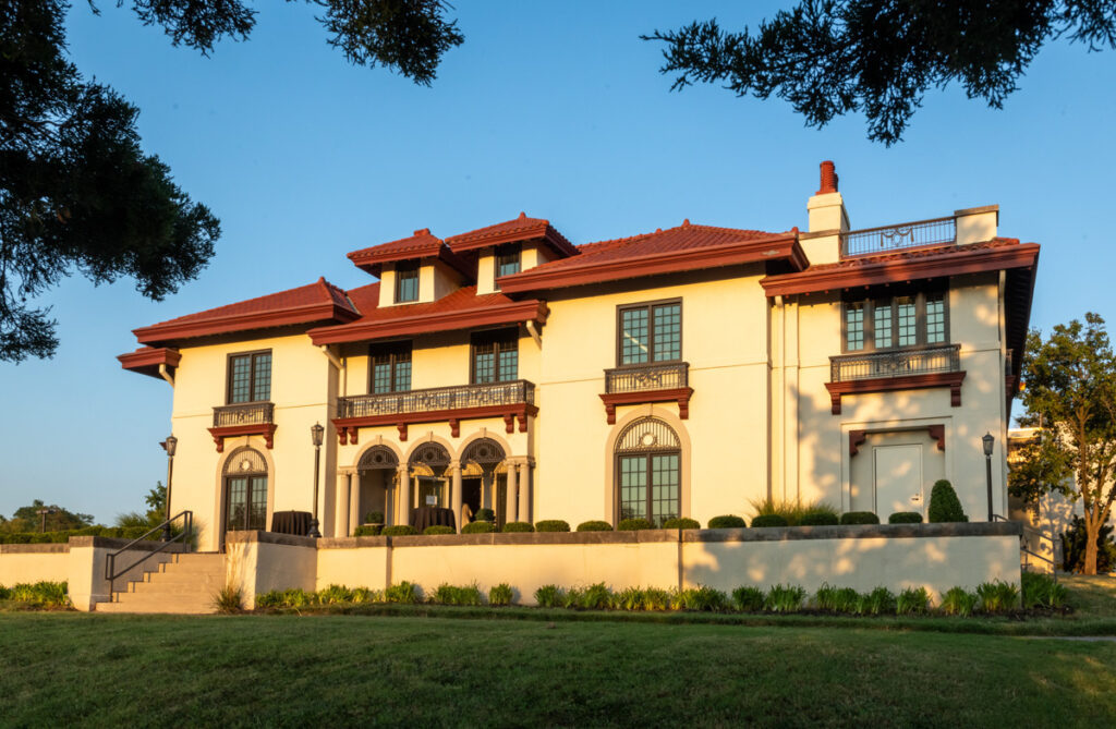 Exterior of the Tureman Mansion at sunset.